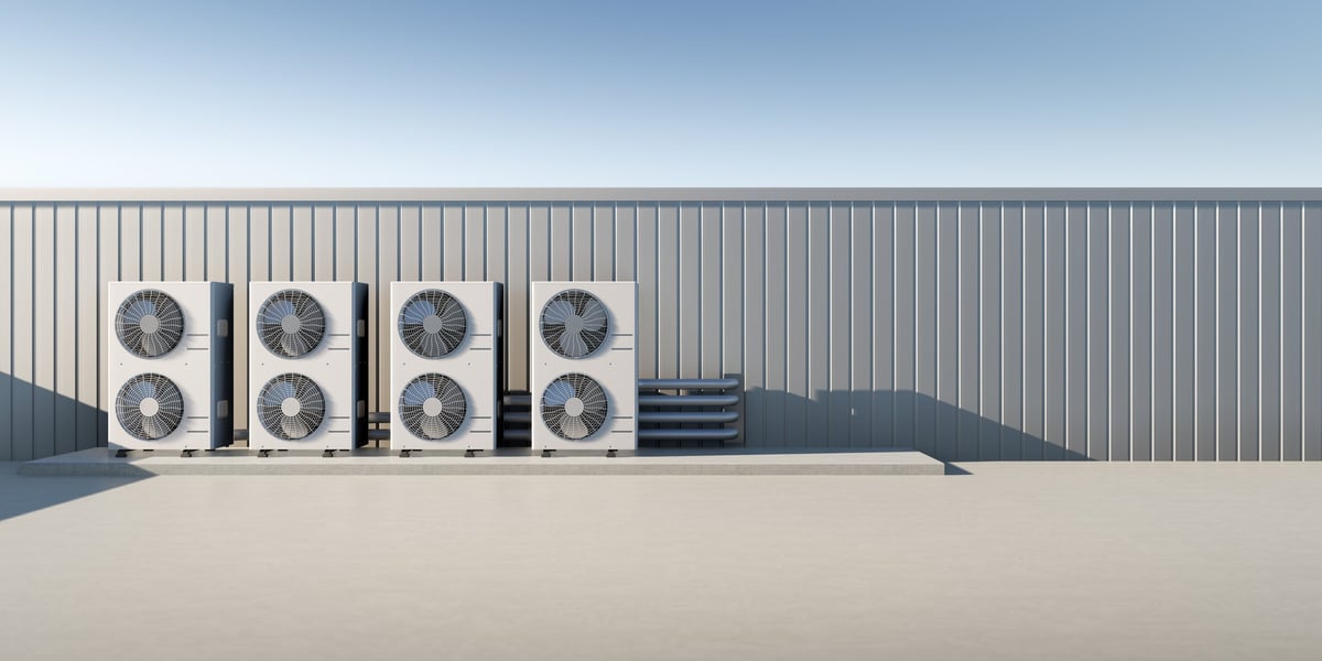 Rooftop air conditioning condenser units on a commercial building